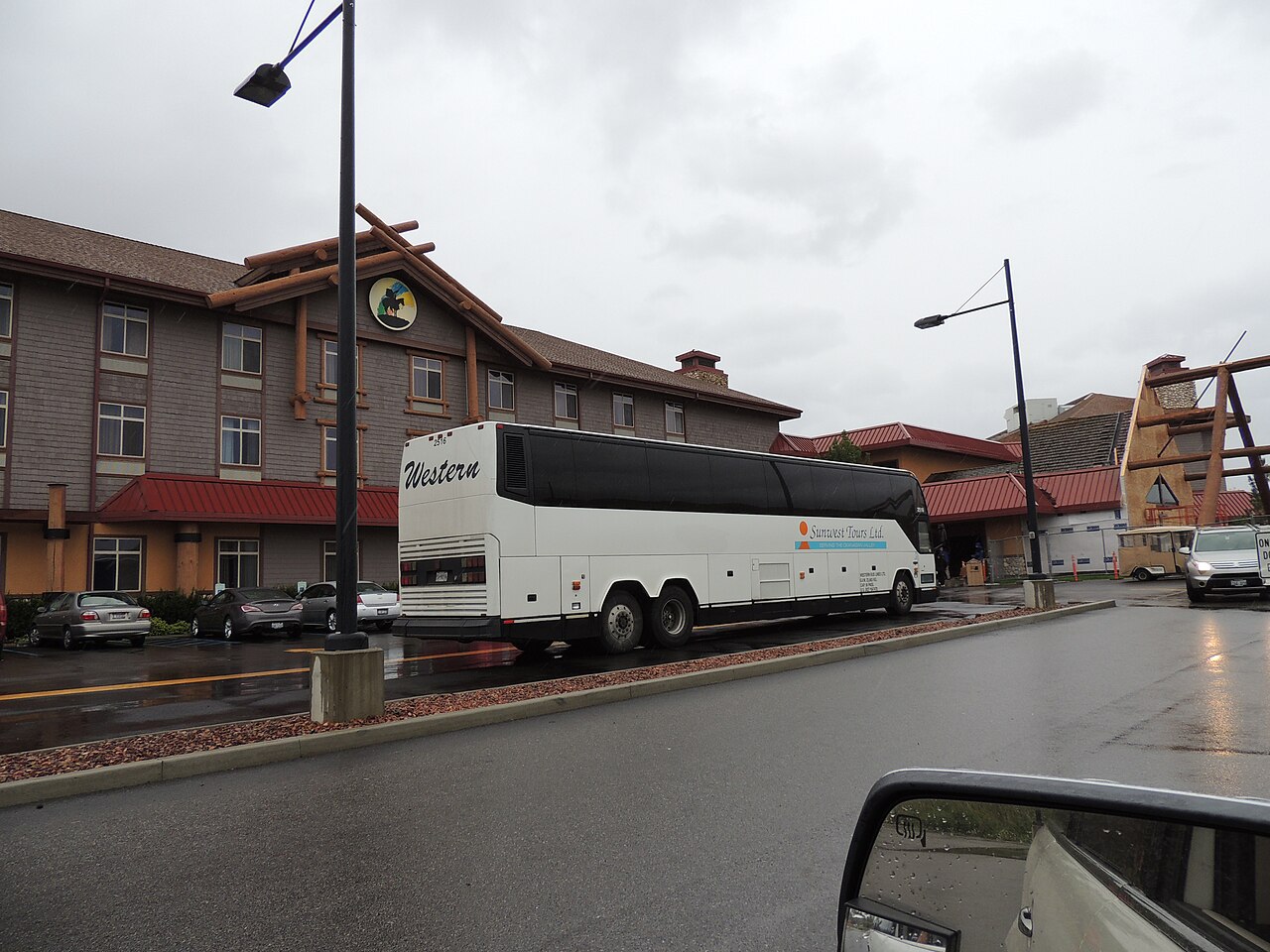 Coeur d'Alene Casino Resort Hotel near Worley, Idaho, with a tour bus parked outside.